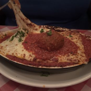 Rocco's Ristorante - Check out that cheese pull! - Italian Near Me - Ceredo, West Virginia
