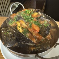 Basquaise mussels at Rene's Bistro in Stratford, one of our four signature mussel styles, with tomato, peppers & garlic.