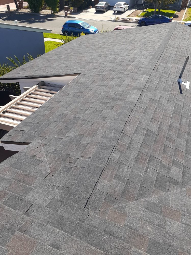 Slide of TopCal Roofing