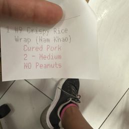 I ordered my food with out peanuts and my receipt confirmed my order .