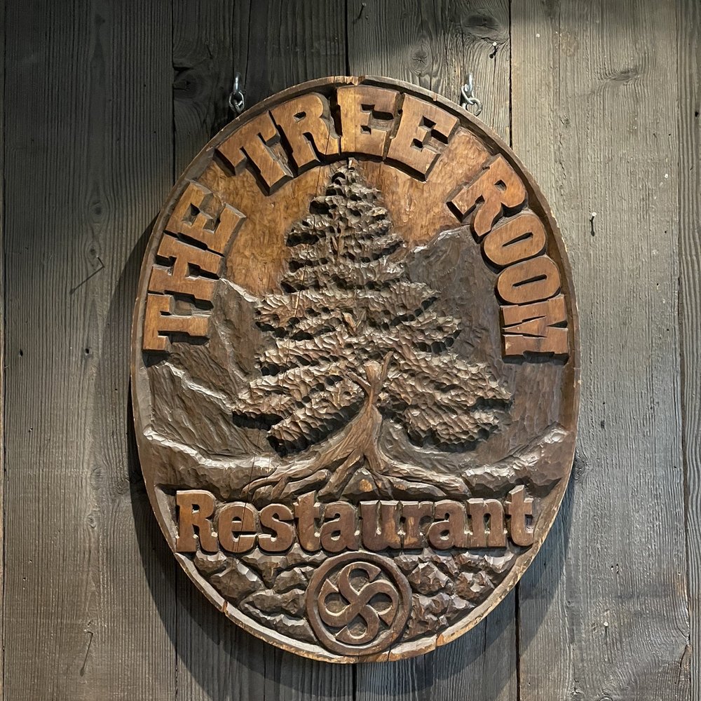 The Tree Room - a carved sign on a wooden wall - New American Near Me - Sundance, Utah The Tree Room - a carved sign on a wooden wall - New American Near Me - Sundance, Utah