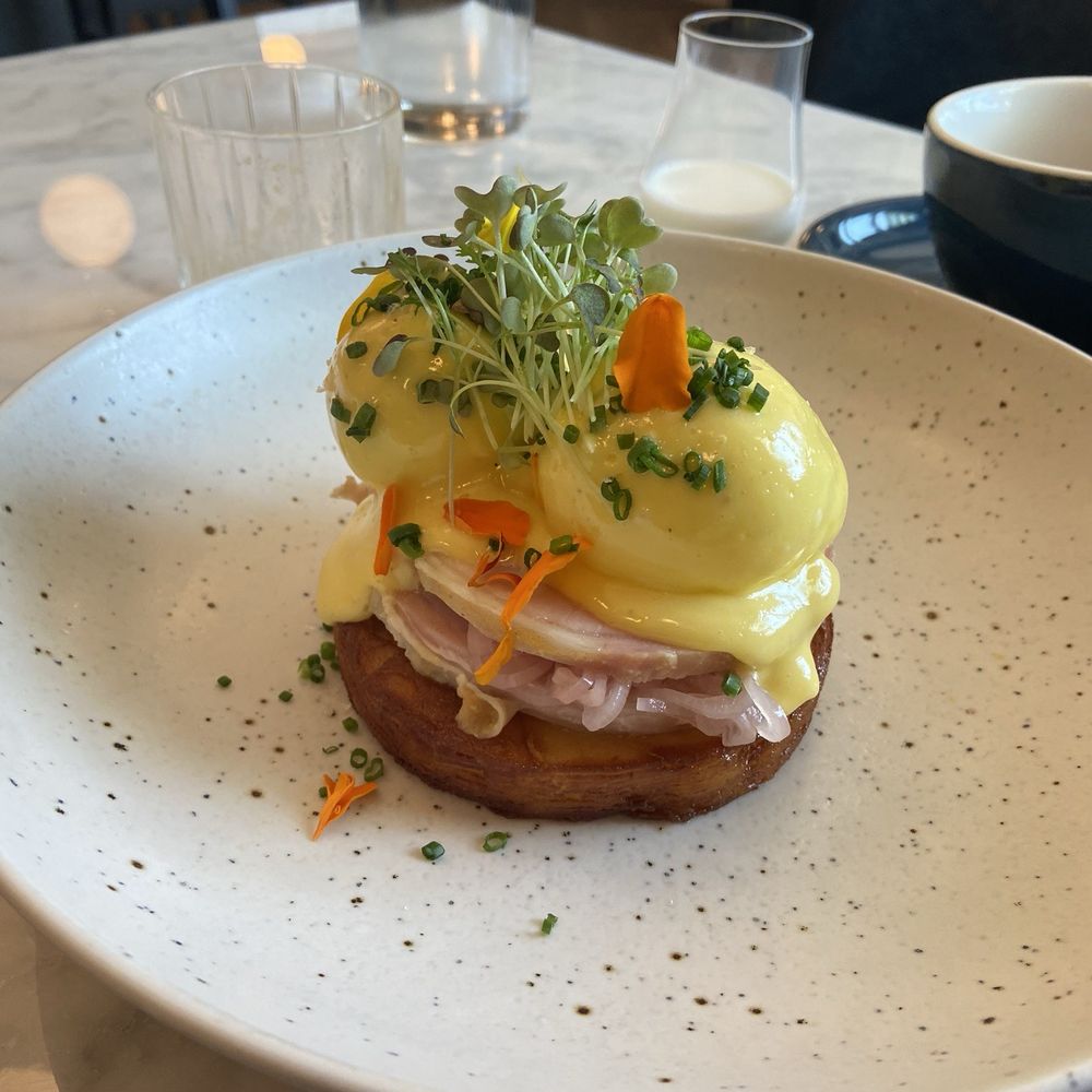 The Tremont Cafe - Poached eggs and ham with potatoes and Hollandaise sauce... - Cafes Near Me - Collingwood, Ontario The Tremont Cafe - Poached eggs and ham with potatoes and Hollandaise sauce... - Cafes Near Me - Collingwood, Ontario