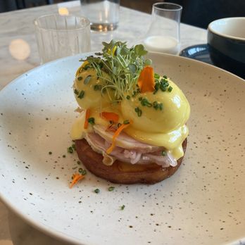 The Tremont Cafe - Poached eggs and ham with potatoes and Hollandaise sauce... - Cafes Near Me - Collingwood, Ontario The Tremont Cafe - Poached eggs and ham with potatoes and Hollandaise sauce... - Cafes Near Me - Collingwood, Ontario