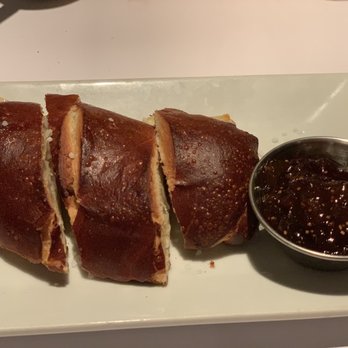 Mim's Restaurant - Pretzel stuffed with Brie with fig jam. - American Near Me - Roslyn Heights, New York Mim's Restaurant - Pretzel stuffed with Brie with fig jam. - American Near Me - Roslyn Heights, New York