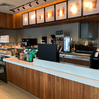 Starbucks - a coffee shop counter with a variety of drinks - Coffee & Tea Near Me - Columbus, Ohio