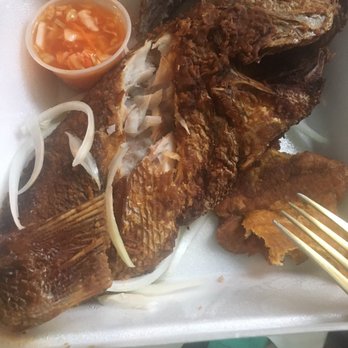 Ronald's Haitian Cuisine - Fried red snapper with side plantains and pikliz - Haitian Near Me - Bridgeport, Connecticut Ronald's Haitian Cuisine - Fried red snapper with side plantains and pikliz - Haitian Near Me - Bridgeport, Connecticut