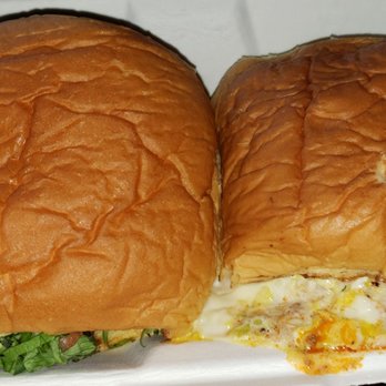 Al's Burger Shack - Why put two burgers in one container?  The Bobo chili cheeseburger and Sean's bacon chedderburger.  Burgers were good and cooked to order. - Burgers Near Me - Chapel Hill, North Carolina