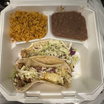 Nachomamas Tex-Mex - Two sad tacos missing their sibling (I ordered and was charged for 3). Not much meat. Not much fajita veggies. - Tex-Mex Near Me - St Louis, Missouri