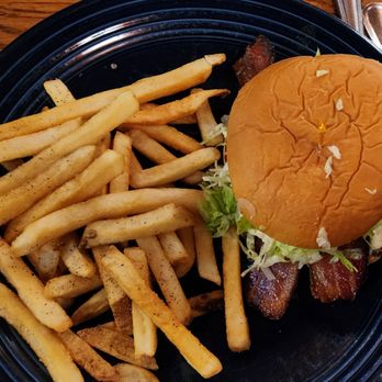 The Kill Devil Grill - Grilled Chicken Sandwich ($15) with bacon, Jack cheese, lettuce, tomato, and fries. - American Near Me - Kill Devil Hills, North Carolina