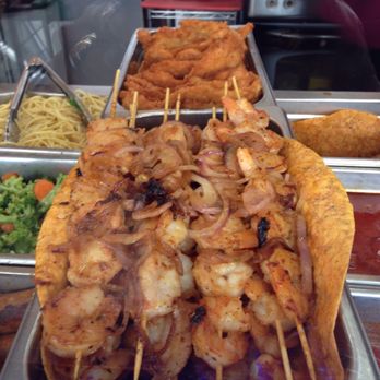 Cesar's Gourmet Cafe - Fresh grilled shrimp skewers can be used to build salads, wraps or paired with their many side dishes. Yummy! - Coffee & Tea Near Me - Brooklyn, New York Cesar's Gourmet Cafe - Fresh grilled shrimp skewers can be used to build salads, wraps or paired with their many side dishes. Yummy! - Coffee & Tea Near Me - Brooklyn, New York