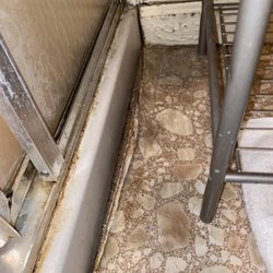 Tom's Place Cafe - Bathroom flooring lifting