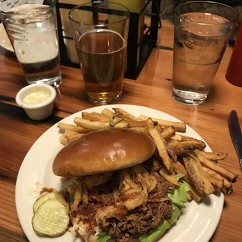 OMC Smokehouse - Pulled pork sandwich with onion strings and coleslaw. Duck fat fries. - Barbeque Near Me - Duluth, Minnesota