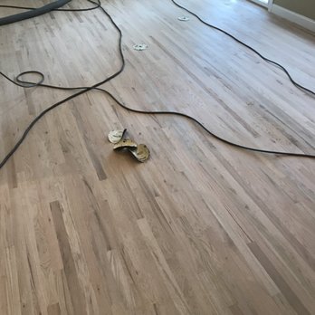 Re-Nu Floor Sanding - a hardwood floor being sanded - Flooring Near Me Re-Nu Floor Sanding - a hardwood floor being sanded - Flooring Near Me