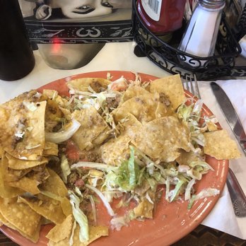Jefes by El Jaripeo - Worst plate of nachos ever.  Chips floating in some white runny cheese sauce. Never again. Half of our party had mistakes in their order - Mexican Near Me - Waupaca, Wisconsin