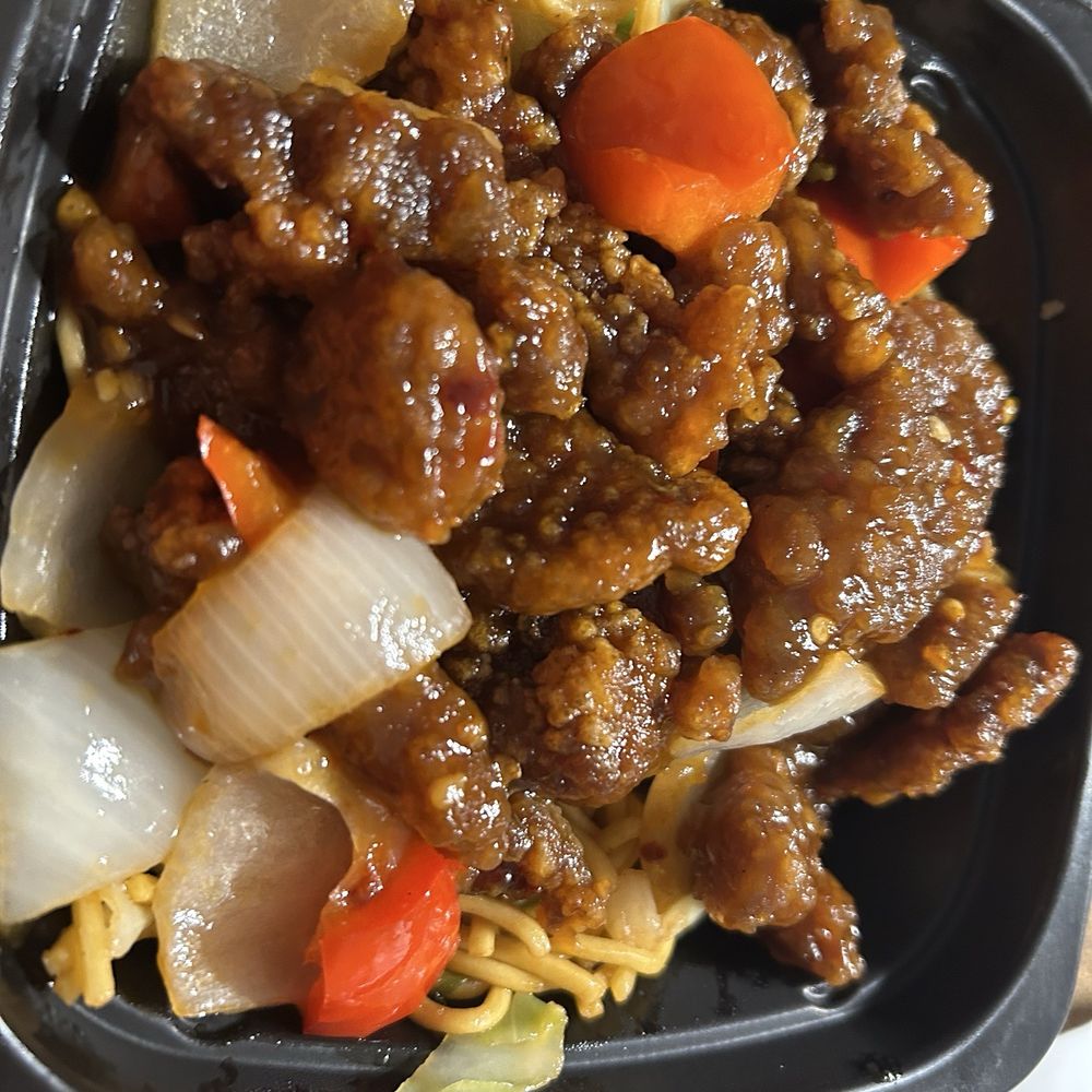 Panda Express - Lots of chopped onions, thin layer of beef on an even more portion of "the side" chow mein. - Chinese Near Me - Lockport, Illinois Panda Express - Lots of chopped onions, thin layer of beef on an even more portion of "the side" chow mein. - Chinese Near Me - Lockport, Illinois