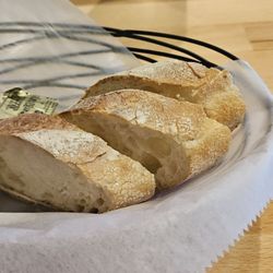 Crusty Italian bread served when you are seated.