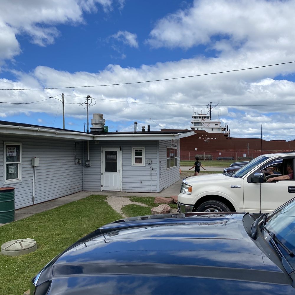 West Pier Drive-In - two cars parked in front of a motel - Burgers Near Me - Sault Ste. Marie, Michigan