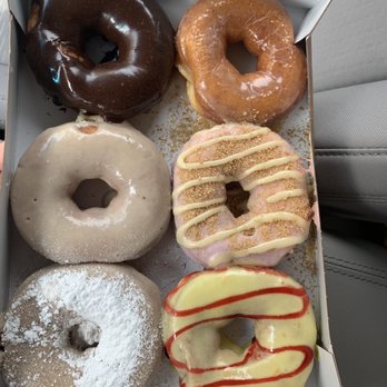 Duck Donuts - Chocolate, glazed, maple, strawberry cheesecake (had lemon instead of cream cheese frosting), French toast, and sunrise. - Coffee & Tea Near Me - Pfluegerville, Texas