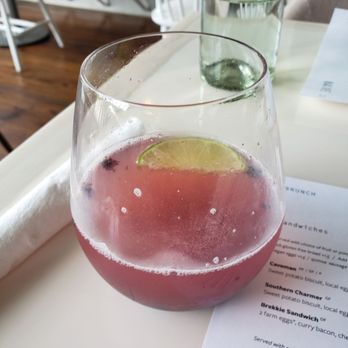 Naïve - Wild berry and lime mimosa. Very good! - New American Near Me - Louisville, Kentucky