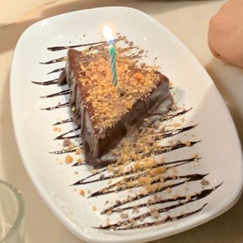 Glacier BrewHouse - Original Peanut Butter Pie (with a birthday candle) - American Near Me - Anchorage, Alaska