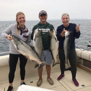 Fishtown Charter Service - First Mate Mike Osorio holding up some nice King Salmon with some lovely young ladies we had on this summer! - Boat Charters Near Me Fishtown Charter Service - First Mate Mike Osorio holding up some nice King Salmon with some lovely young ladies we had on this summer! - Boat Charters Near Me