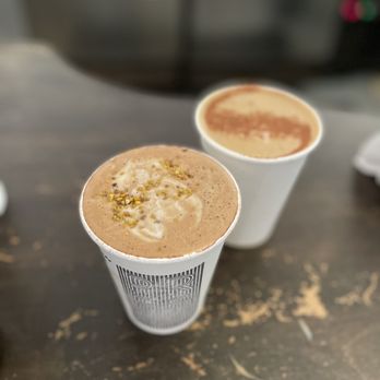 The Press Espresso  - Seasonal latte in the front: Jasmine, honey, bee pollen, cacao - Bakeries Near Me - Temecula, California