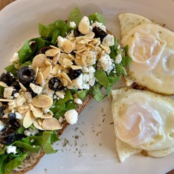 La Boulangerie Boul'Mich - Greek Avocado Toast- with 2 fried eggs added - Breakfast & Brunch Near Me - Key Biscayne, Florida La Boulangerie Boul'Mich - Greek Avocado Toast- with 2 fried eggs added - Breakfast & Brunch Near Me - Key Biscayne, Florida