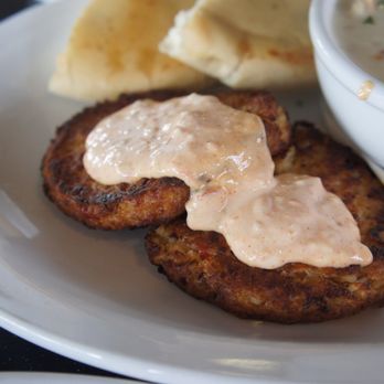 Pier Bistro - Closeup of crab cakes - Seafood Near Me - Sidney, British Columbia Pier Bistro - Closeup of crab cakes - Seafood Near Me - Sidney, British Columbia