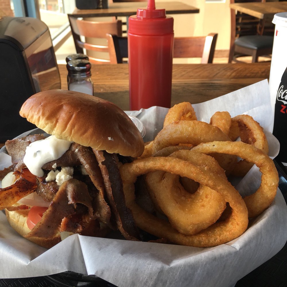 Kojak's - Greek freak burger with generous side of onion rings and a drink. $12.83... pricey, but food was good. - American Near Me - Cary, Illinois Kojak's - Greek freak burger with generous side of onion rings and a drink. $12.83... pricey, but food was good. - American Near Me - Cary, Illinois