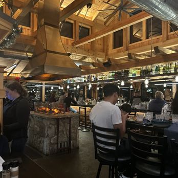 Firewater Kitchen + Bar - people sitting at the bar - Salad Near Me - Oakland, Maryland
