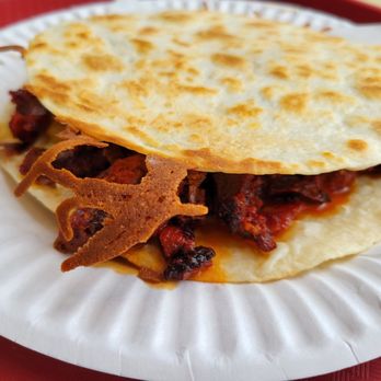 Tacos Y Más - Taco Gringa has al pastor, cheese, and pineapple chunks inside. Very large, fork and knife recommended. - Tacos Near Me - Corona, California Tacos Y Más - Taco Gringa has al pastor, cheese, and pineapple chunks inside. Very large, fork and knife recommended. - Tacos Near Me - Corona, California