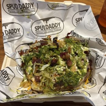 Spud Daddy - Baked potato with garlic butter, salt, pepper, cheese, baked beans, bacon, sour cream, chimichurri - Specialty Food Near Me - Boise, Idaho Spud Daddy - Baked potato with garlic butter, salt, pepper, cheese, baked beans, bacon, sour cream, chimichurri - Specialty Food Near Me - Boise, Idaho