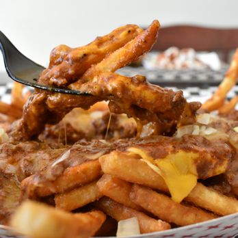 Roots 89 Grill - a plate of fries with cheese and meat - Burgers Near Me - Spring City, Utah