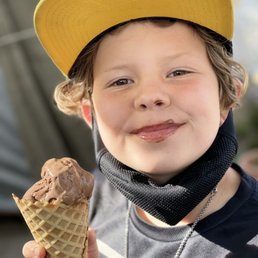 Nine year old with delicious ice cream