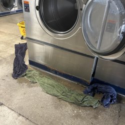 Laundry Basket - This mess has been here for over a week. The smell is awful.