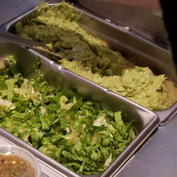 Chipotle Mexican Grill - Dark brown layer over guacamole. When asked if they had any freshly made, the server just stirred the doo doo brown layer underneath! - Mexican Near Me - Germantown, Maryland