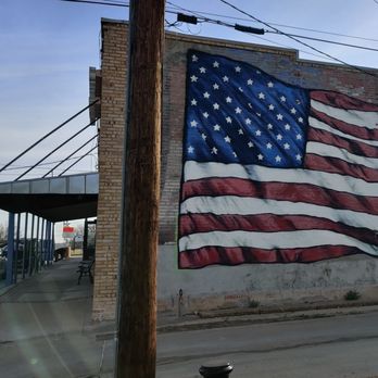 Bill Smiths Cafe - an american flag painted on the side of a building - Breakfast & Brunch Near Me - Van Alstyne, Texas