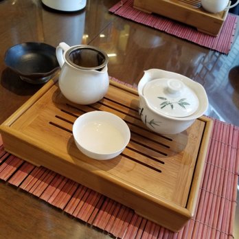 Ming Tao Xuan - a tea set on a table - Tea Rooms Near Me - Montreal, Quebec Ming Tao Xuan - a tea set on a table - Tea Rooms Near Me - Montreal, Quebec