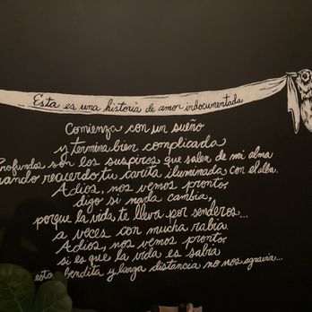 Aguardente - Wall decor with a Spanish poem. - Cocktail Bars Near Me - Providence, Rhode Island Aguardente - Wall decor with a Spanish poem. - Cocktail Bars Near Me - Providence, Rhode Island