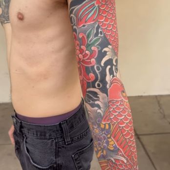 Living Canvas Tattoos - Japanese traditional double koi and chrysanthemum sleeve by Mark Walters - Tattoo Near Me - Tempe, Arizona Living Canvas Tattoos - Japanese traditional double koi and chrysanthemum sleeve by Mark Walters - Tattoo Near Me - Tempe, Arizona