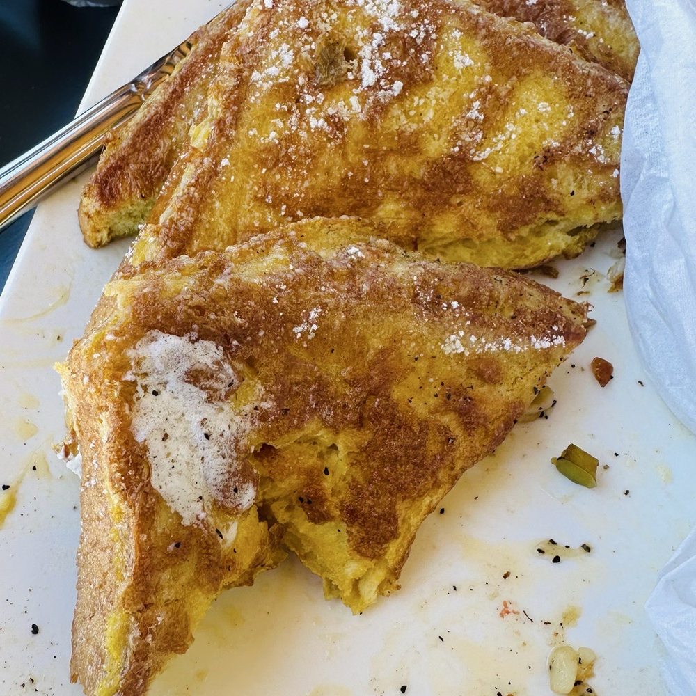 Cedar Park Cafe - 3 pieces of French Toast left on my plate. You do get three whole pieces of bread and not just the 3 halves/triangles. - Breakfast & Brunch Near Me - Cedar Park, Texas