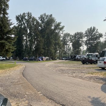 Spruce Park On the River RV Park - Looking back towards the office from site F5 - RV Parks Near Me - Kalispell, Montana Spruce Park On the River RV Park - Looking back towards the office from site F5 - RV Parks Near Me - Kalispell, Montana