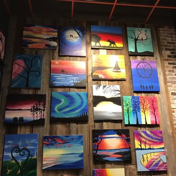 Muse Paintbar - Collage on the wall in one of the paint rooms. - Paint & Sip Near Me - Gainesville, Virginia
