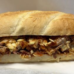 Clipper Galley - Pulled Pork Sandwich with house made slaw served on a toasted roll
