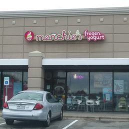 a car parked in front of the store