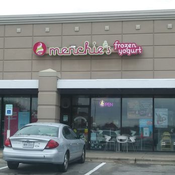 Menchie's Frozen Yogurt - a car parked in front of the store - Ice Cream & Frozen Yogurt Near Me - Austin, Texas