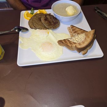 Buenos Dias - Over'easy eggs, sausage, grits, and toast - Breakfast & Brunch Near Me - Anderson, South Carolina Buenos Dias - Over'easy eggs, sausage, grits, and toast - Breakfast & Brunch Near Me - Anderson, South Carolina