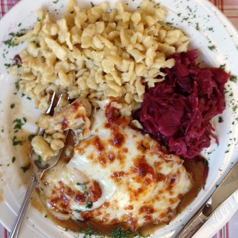 Schmankerl Stube - Kaseschnitzel: Pork Cutlet over baked with Camembert and Provolone, Spatzle, cabbage - German Near Me - Hagerstown, Maryland Schmankerl Stube - Kaseschnitzel: Pork Cutlet over baked with Camembert and Provolone, Spatzle, cabbage - German Near Me - Hagerstown, Maryland