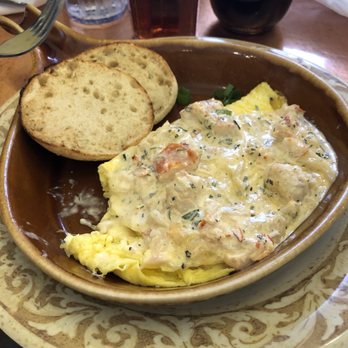 Another Broken Egg Cafe - Had to dig in before he took the pic, greedy me. Lobster omelette with Brie and ricotta - Breakfast & Brunch Near Me - Pensacola, Florida Another Broken Egg Cafe - Had to dig in before he took the pic, greedy me. Lobster omelette with Brie and ricotta - Breakfast & Brunch Near Me - Pensacola, Florida