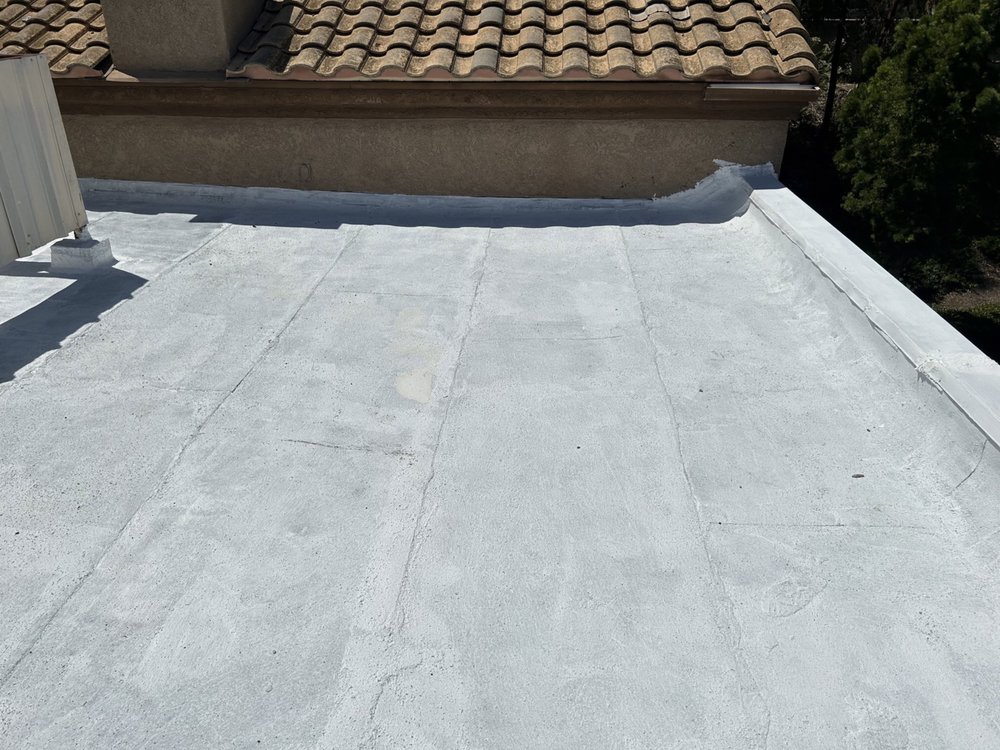 Slide of MA Rain Gutters